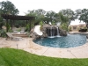 Custom Pool with Grotto, Waterfall and Slide